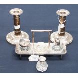 A pair of weighted silver candlesticks, Birmingham 1904,