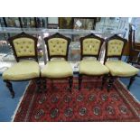 A set of six mid Victorian mahogany dining chairs, raised on turned legs.