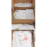 Four boxes of linen including embroidered white work, damask, sheets, towels,