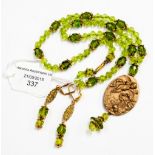 Cherub necklace (peridot green) with matching plique a jour earrings