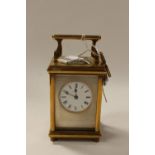 A Victorian brass carriage timepiece,