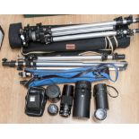 A collection of camera equipment, including a Bronica 120 back,