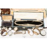 Two ladies 9ct gold wristwatches, a silver backed nurses watch,