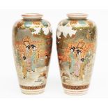 A pair of Japanese Meiji period vases, of tapering form, hand painted and gilded,