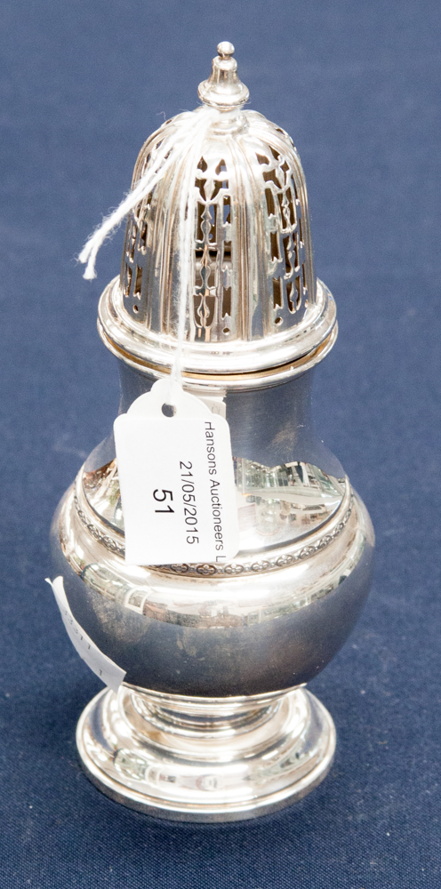 A silver sugar shaker,