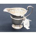 A silver gravy jug, Birmingham 1958,