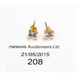 A pair of 9ct gold and CZ studs