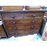A mid Victorian mahogany chest of drawers, fitted with two short over three long graduated drawers.
