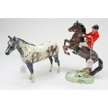 A Beswick Huntsman on rearing horse No. 868, with a Beswick Appaloosa horse, No.