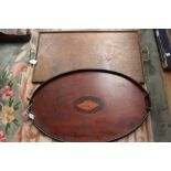 An Edwardian inlaid oval gallery tray and an oak oblong tray