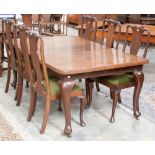 An early 20th century mahogany wind out dining table, raised on cabriole legs,