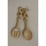 A pair of antique ivory salad servers (2)