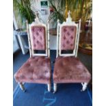 A pair of 19th Century Gothic design low chairs (2)