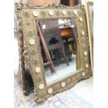 A square beveled edge mirror, set in approx 10cm deep gilded frame,