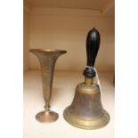 A pair of field binoculars, a bell,
