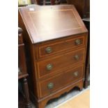 An Edwardian mahogany ladies bureau, the fall front opening to reveal fitted interior,