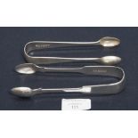 A George III pair of silver sugar nips, Newcastle 1818; together with a similar pair, Victorian,