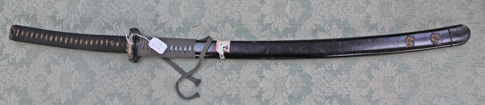 A Japanese samuri sword katana with 70 cm blade and  visible hamon, tang not viewed,