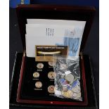 A case of enamelled Elizabeth II coins,