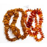 Two strands of Polish amber beads, one unpolished,