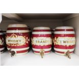 Eight Victorian ceramic spirit barrels including Whisky and Portwine,