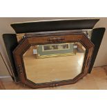 An early 20th century oak framed mirror, circa 1930, fitted with bevelled glass,