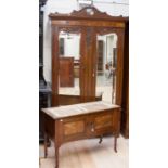 A Victorian walnut double wardrobe,