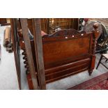 An early Victorian half tester bed,