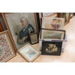 A box of watercolours and prints together with a large print of Queen Victoria