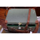 A baize lined shotgun cartridge case of suitcase form,