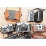 Five various cameras, including a cased Brownie camera,