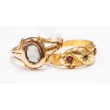 An 18ct gold gypsy set ruby and diamond ring and a 15ct cameo ring