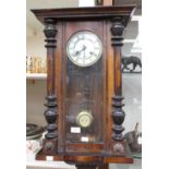 A mid to late 19th Century Vienna wall clock with an eight day movement,