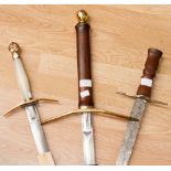 Three decorative swords,