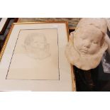 A plaster cast of a baby's head;