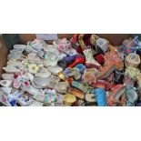 A large collection of approximately two hundred miniature shoes,