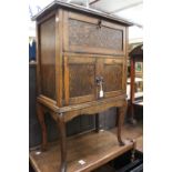 A George V oak sewing cabinet