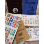 A box of assorted stamps,