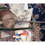 A box of collectables, including metronome, doll,