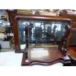 A 19th Century mahogany over-mantle mirror together with a converted wall shelf (2)