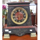 A French marble clock with gilt metal Egyptian masks as handles, etched Egyptology figures, S.