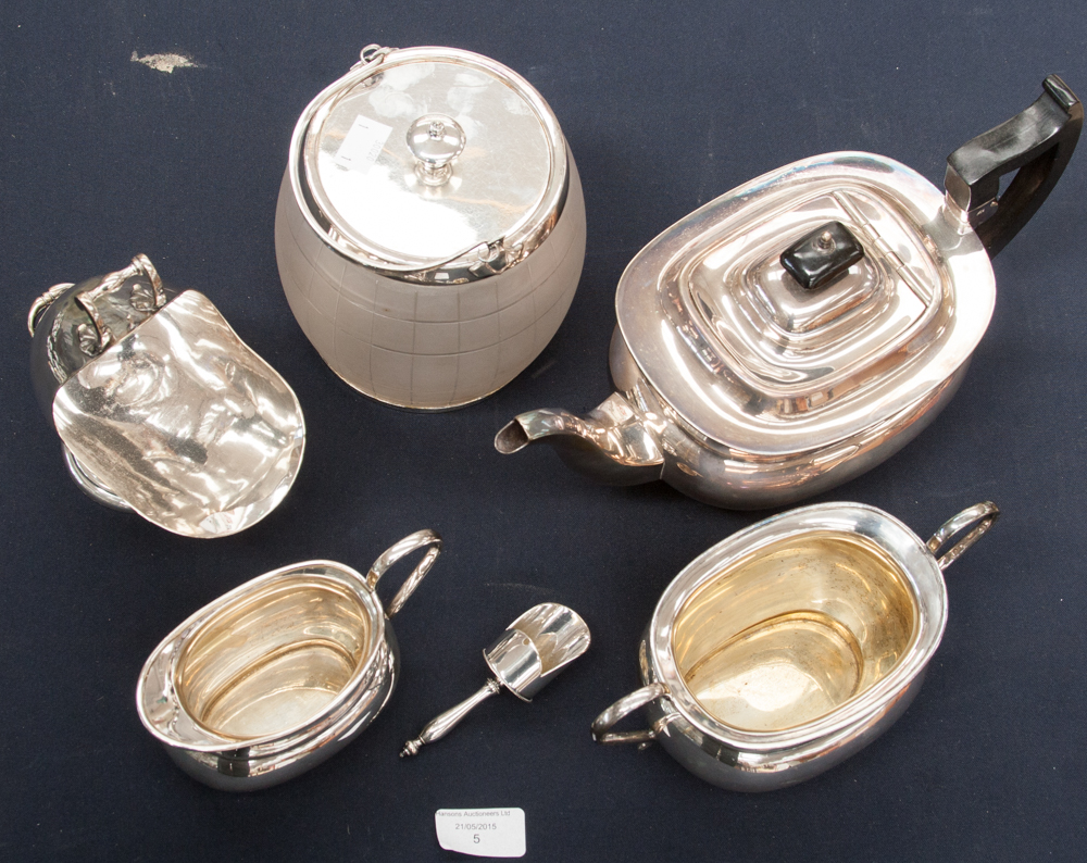 A silver plated boat shape teapot, sucrier and jug,