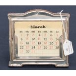 A perpetual calendar with ivorine months/day cards,