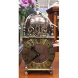 A Smiths brass mantle clock in the 17th Century style,