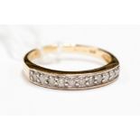 A 9ct gold diamond half eternity ring