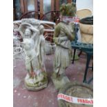 Three stone and composite statues, one in the form of a semi-clad lady,