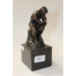 After Rodin, a bronze figure, The Thinker, on black marble base,