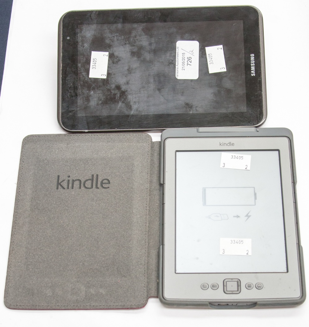 A Samsung tablet, plus a Kindle,