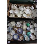 Two boxes of assorted tea wares and coffee cups and saucers,