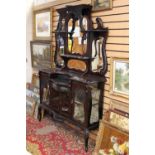 A late Victorian walnut mirror backed chiffonier